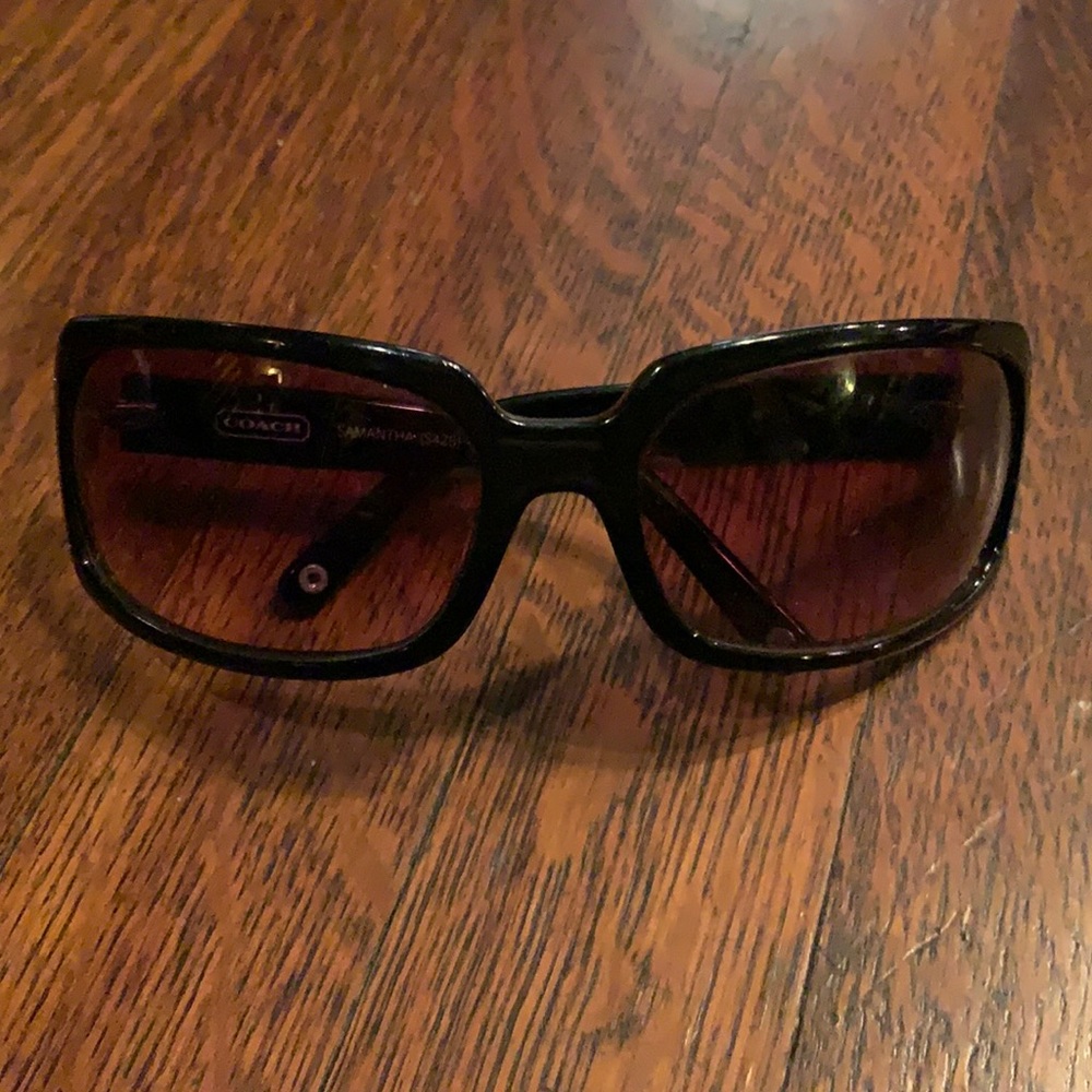 Black Coach sunglasses with pink studs